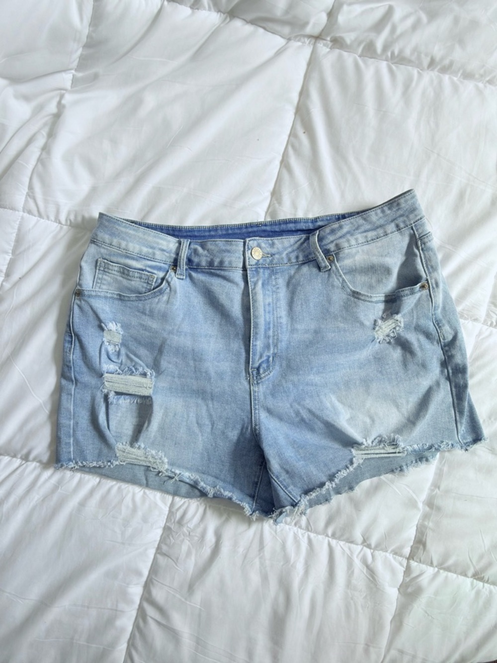 light wash distressed denim shorts